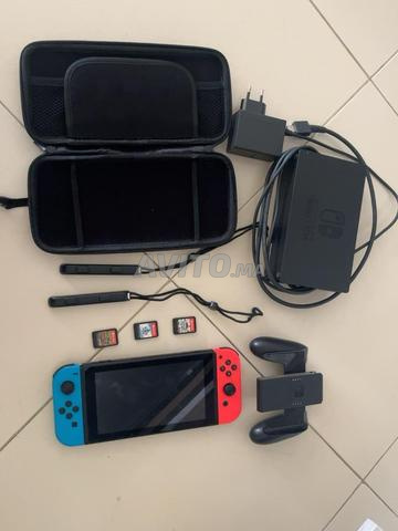 Nintendo Switch V2 avec 3 jeux