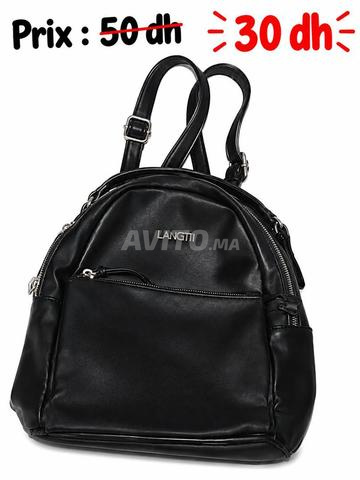 Sac à dos en cuir en bon état