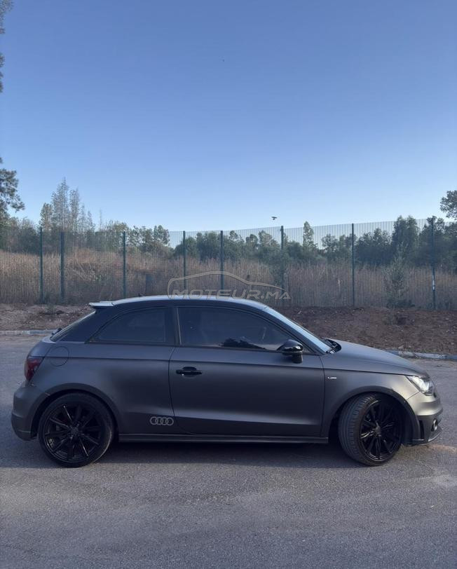 audi a1 blanche habillé en gris souris 2012