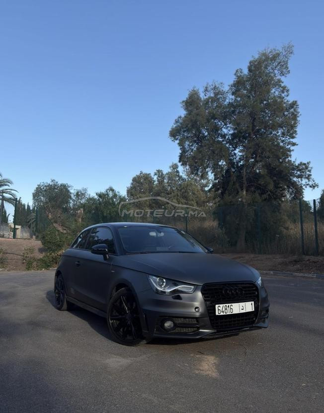 audi a1 blanche habillé en gris souris 2012