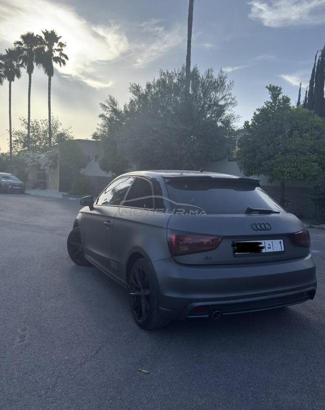 audi a1 blanche habillé en gris souris 2012