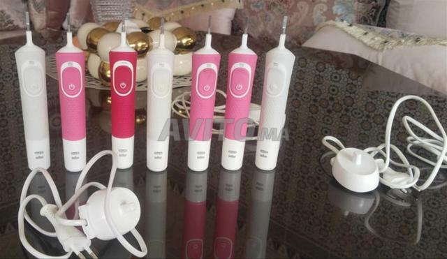 فرشاة أسنان كهربائية ORAL B مع شاحن - 2