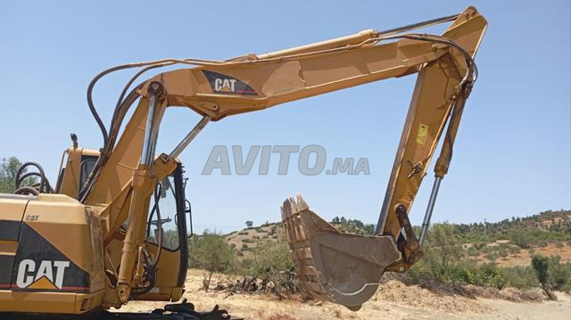 m318 Caterpillar - 2