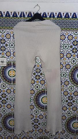 Pantalon beige à patte d’éléphant