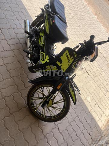 دراجة نارية من طراز C50 لا تزال جديدة مع خدش بسيط