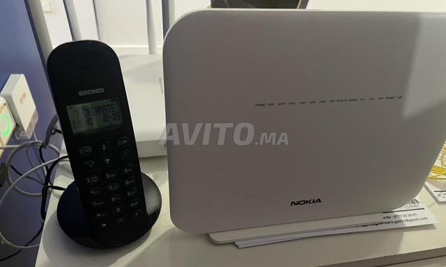 Téléphone Fixe et routeur wifi Nokia comme neuf