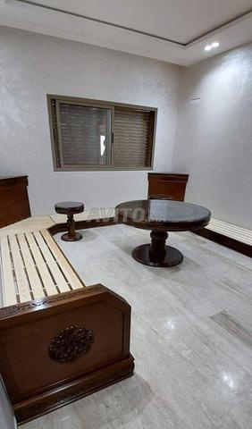 Fabrication de salons marocains en bois avec lettres
