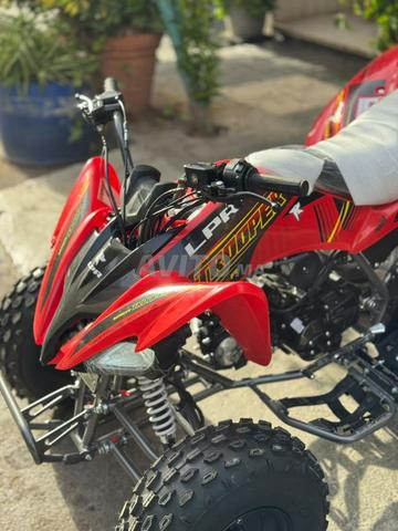 كواد تروبر 125