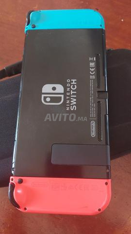 Nintendo Switch V1 + Mario Kart 8 Deluxe - 2700 DH - باب تازة