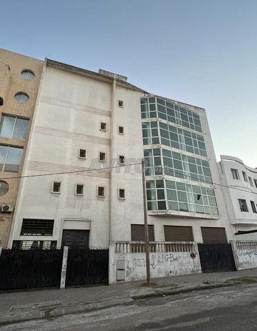 immeuble 2 sous sol RDC et 4 etage