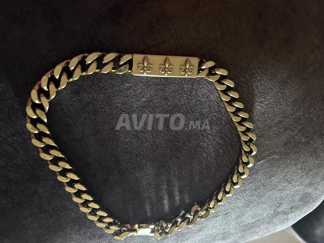 Chaîne Guess dorée
