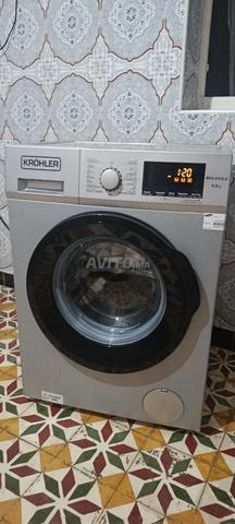 Titre: Machine à laver les vêtements - 2