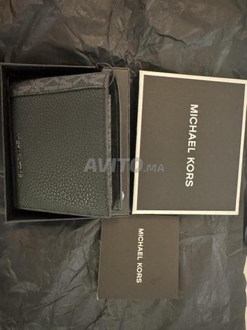 Portefeuille neuf et authentique Micheal Kors
