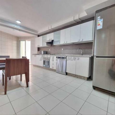148256-Appt à louer à 9500DH à Centre Ville - 2