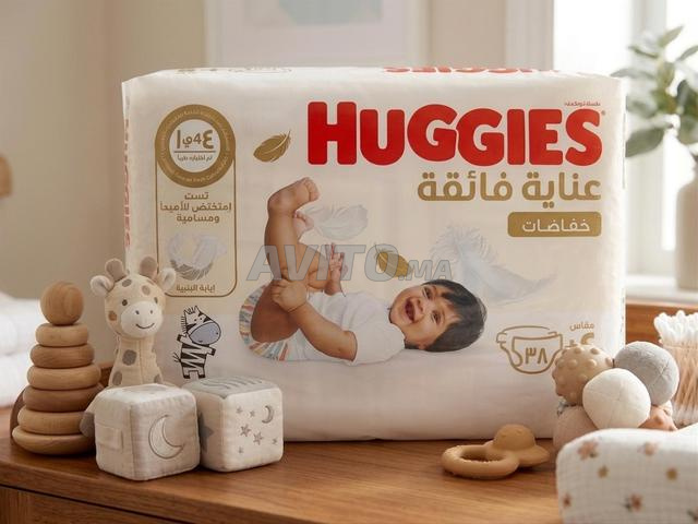 couche HUGGIES value extra care T4 unites 38
