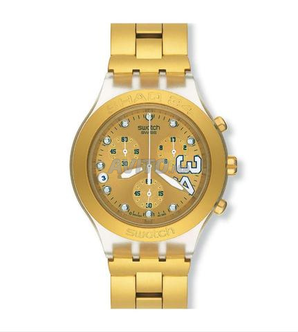 Swatch édition dorée Original Irony Diaphane Chrono Shaq 34
