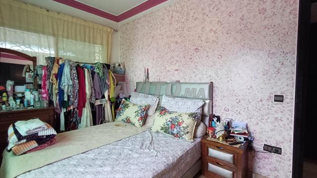 Chambre à coucher et meuble blanc salle de bain