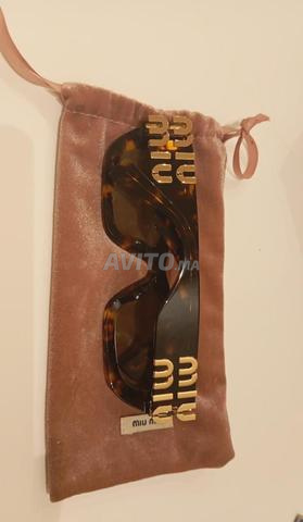 lunette original miu miu Glimps -SMU 11W - 2