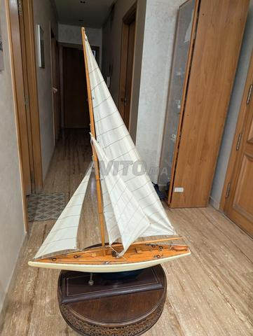 Jolie maquette de voilier en bois verni de 1895. - 2