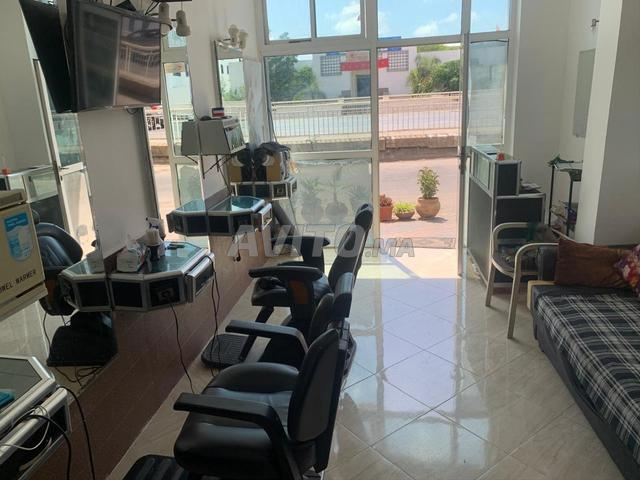 Chaise à louer dans un salon de coiffure pour hommes à Casa.