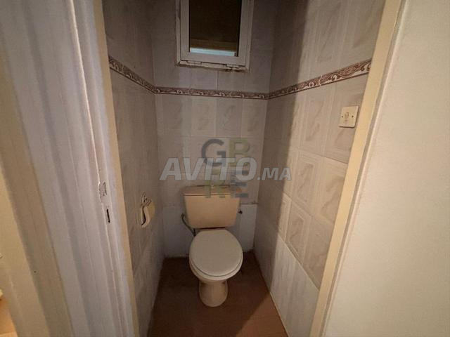 Appartement en rez-de-chaussée avec grande cour
