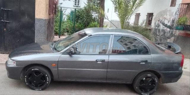 Mitsubishi Lancer 1999 7cv essence - 2