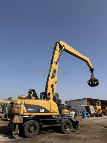 حفار مناولة CAT M322D MH - 2