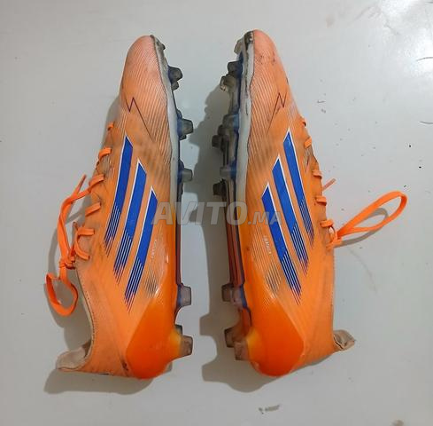 حذاء أديداس F50 برتقالي - 2