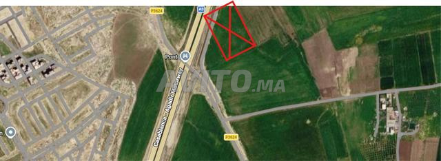 Terrain titré 13562m² sur la route goudronnée - 2
