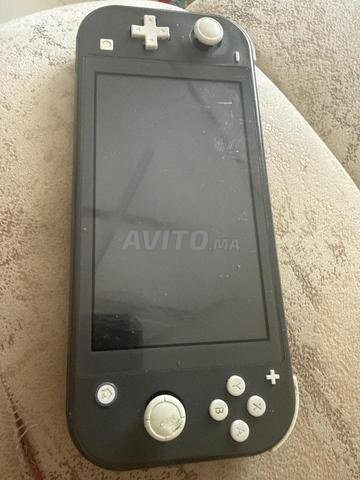 Je vends Switch Lite bon état