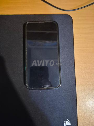iPhone 14 256 Go stockage très bon état - 2
