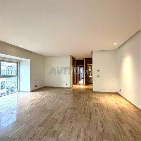 214869-Appt à louer à 13000DH à Casablanca Finance - 2