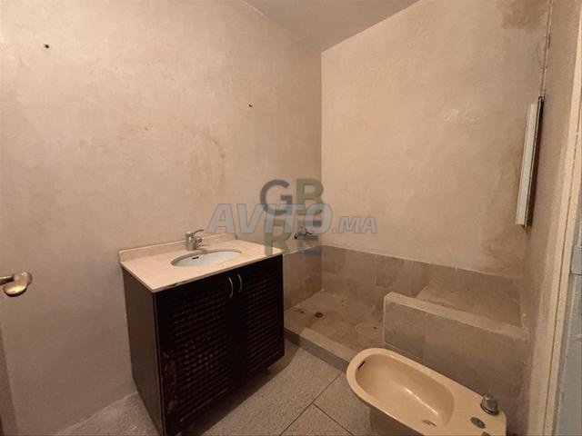 Appartement en rez-de-chaussée avec grande cour
