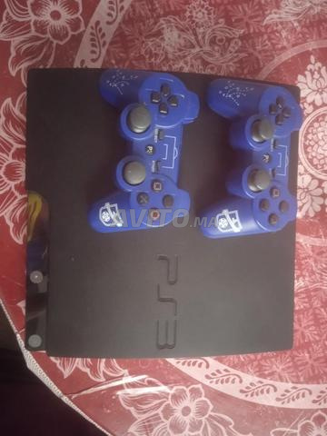 PS3 slim 500gb 2 manettes plus de 27 jeux - 2
