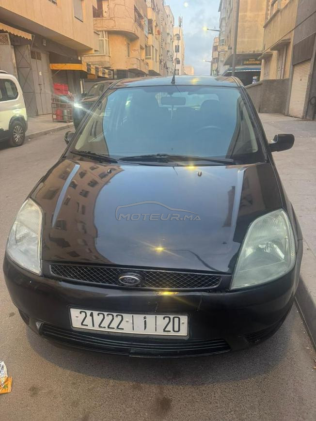 Ford fiesta essence 2004