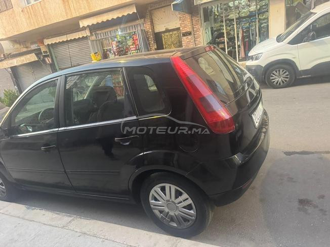 Ford fiesta essence 2004
