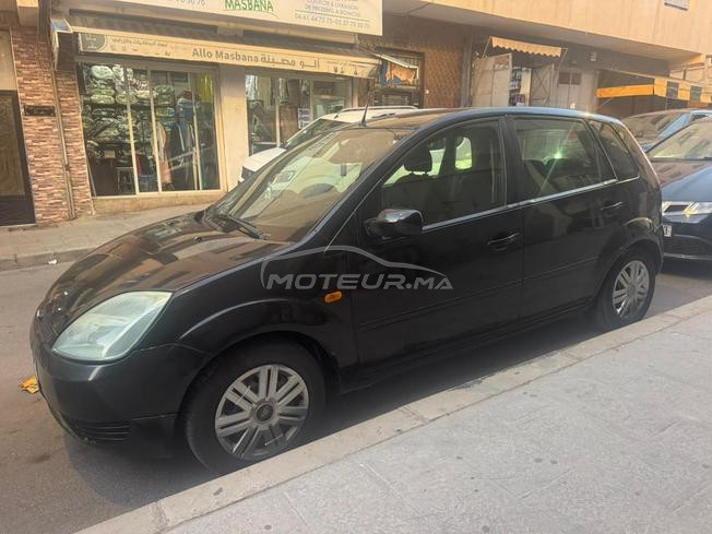 Ford fiesta essence 2004