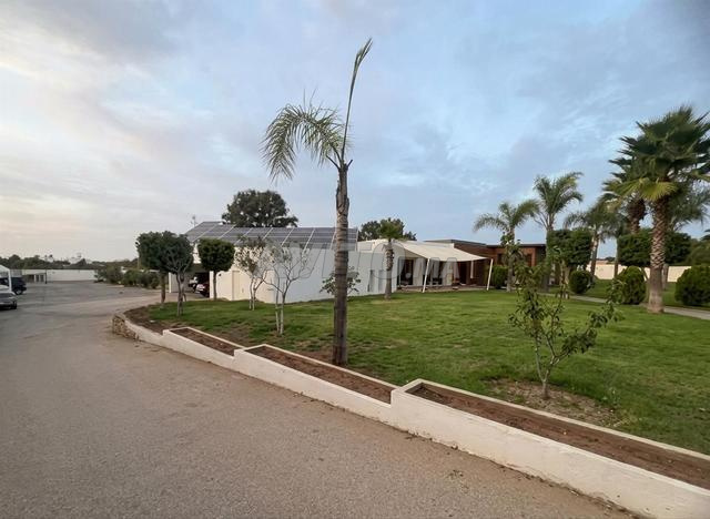 Terrain Villa El Menzeh avec bâtisse existante