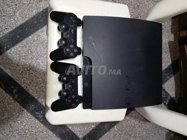 PS 3 slim et 2 manettes de jeux - 2