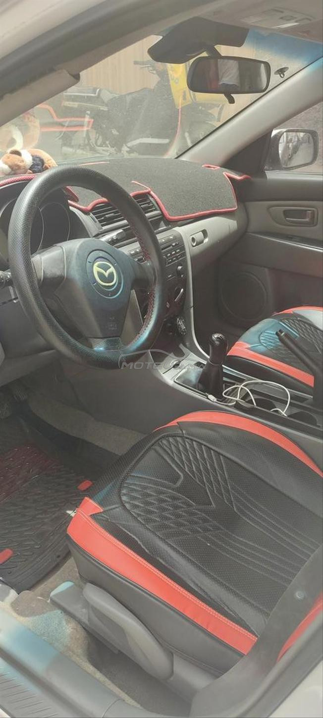 mazda 3 essence dariba 650 dh la clim jante alum