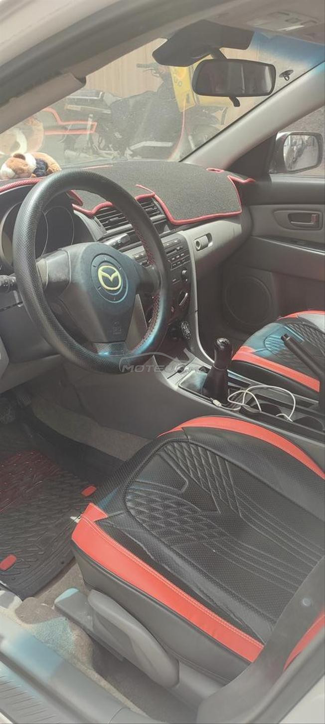 mazda 3 essence dariba 650 dh la clim jante alum