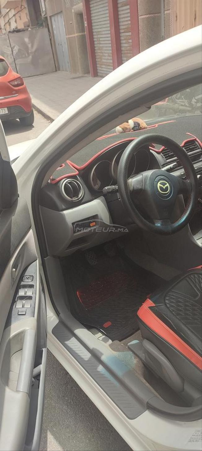 mazda 3 essence dariba 650 dh la clim jante alum