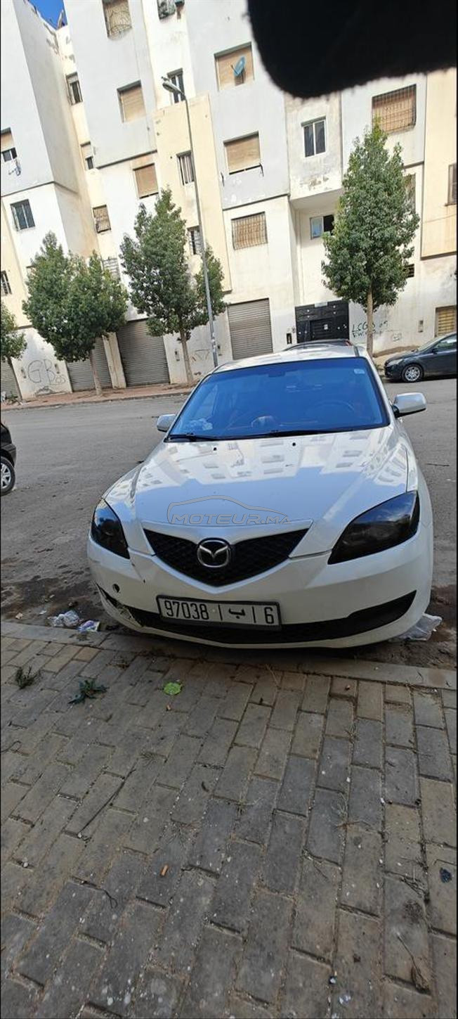 mazda 3 essence dariba 650 dh la clim jante alum