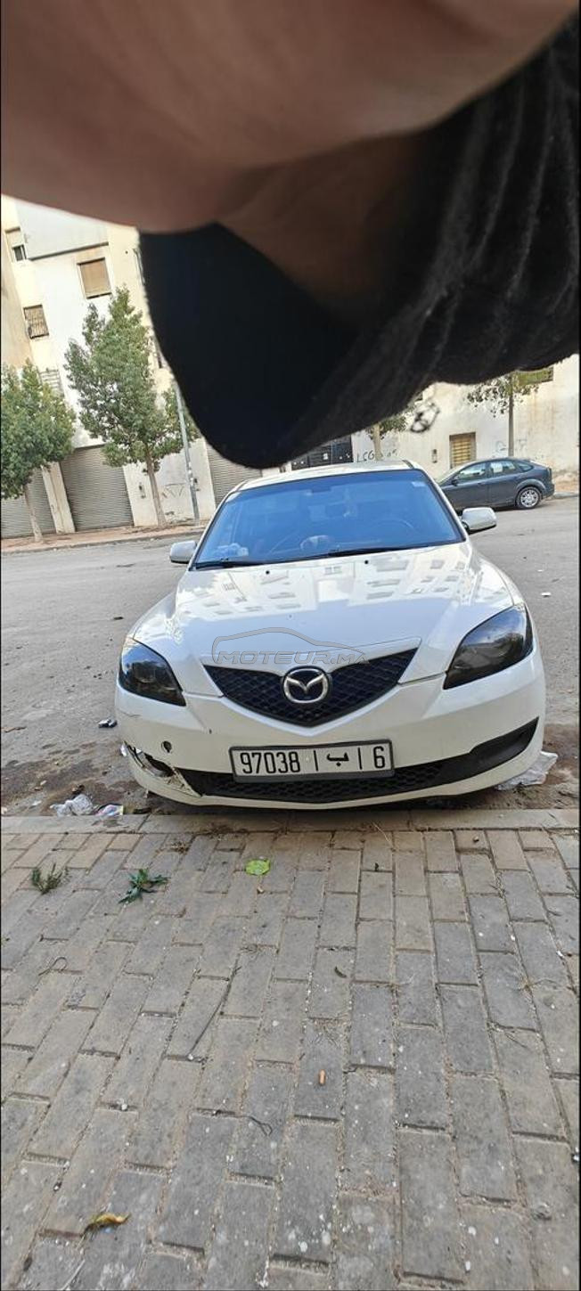 mazda 3 essence dariba 650 dh la clim jante alum
