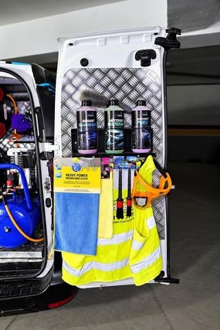 Aménagement de véhicule pour lavage auto mobile