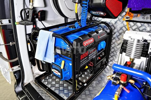 Aménagement de véhicule pour lavage auto mobile
