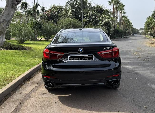 BMW X6 F16 3.0d xDrive – 2015 | Noir / Cuir blanc
