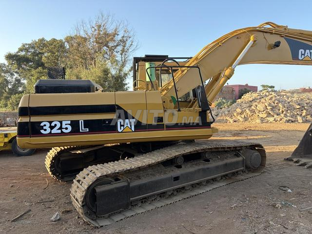 Poclain CATERPILLAR 325L DEDOUANE 08/2026 - 2