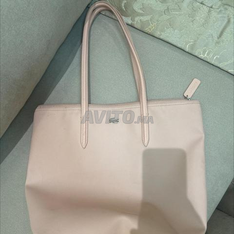 Sac Lacoste rose bon état