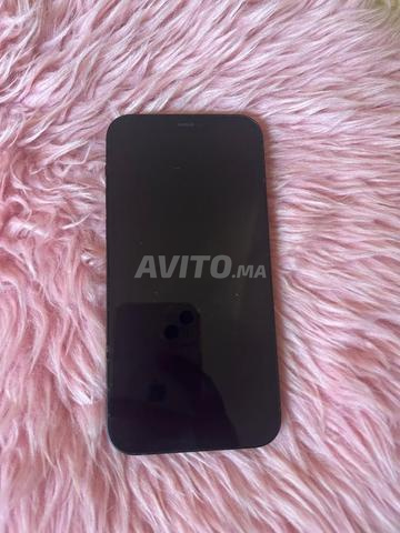 iPhone en bon état, capacité batterie 87% - 2